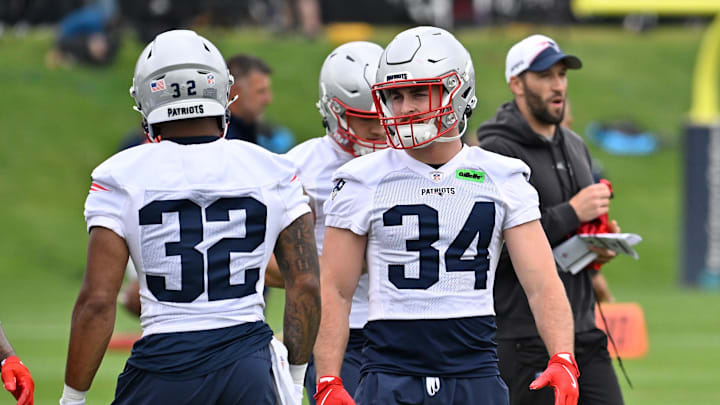 Jun 9, 2025; Foxborough, MA, USA; New England Patriots running back Lan Larison (34) warms up during minicamp at Gillette Stadium. Mandatory Credit: Eric Canha-Imagn Images