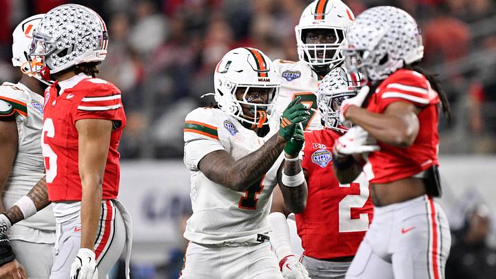 Dec 31, 2025; Arlington, TX, USA; Miami Hurricanes running back Mark Fletcher Jr. (4) reacts after a play in the third quarter against the Ohio State Buckeyes during the 2025 Cotton Bowl and quarterfinal game of the College Football Playoff at AT&T Stadium. Mandatory Credit: Jerome Miron-Imagn Images Dec 31, 2025; Arlington, TX, USA; Miami Hurricanes running back Mark Fletcher Jr. (4) reacts after a play in the third quarter against the Ohio State Buckeyes during the 2025 Cotton Bowl and quarterfinal game of the College Football Playoff at AT&T Stadium. Mandatory Credit: Jerome Miron-Imagn Images