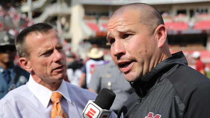 Mississippi State Bulldogs head coach Zach Arnett talks to an ESPN reporter after a game against the Arkansas Razorbacks at Donald W. Reynolds Razorback Stadium. Mississippi State won 7-3.