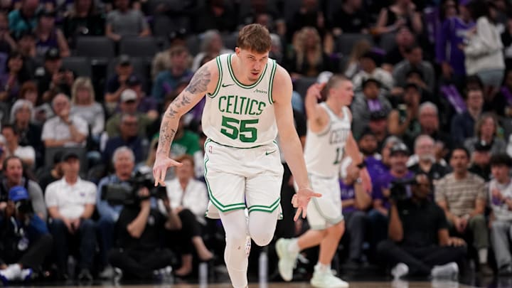 Mar 24, 2025; Sacramento, California, USA; Boston Celtics guard Baylor Scheierman (55) reacts after making a three point basket against the Sacramento Kings in the fourth quarter at the Golden 1 Center. Mandatory Credit: Cary Edmondson-Imagn Images