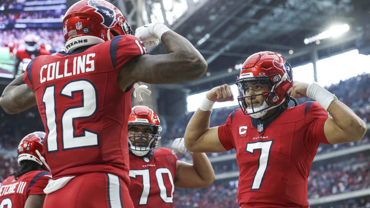 Nov 26, 2023; Houston, Texas, USA; Houston Texans quarterback C.J. Stroud (7) celebrates with wide receiver Nico Collins (12) after a touchdown during the fourth quarter against the Jacksonville Jaguars at NRG Stadium. Mandatory Credit: Troy Taormina-USA TODAY Sports