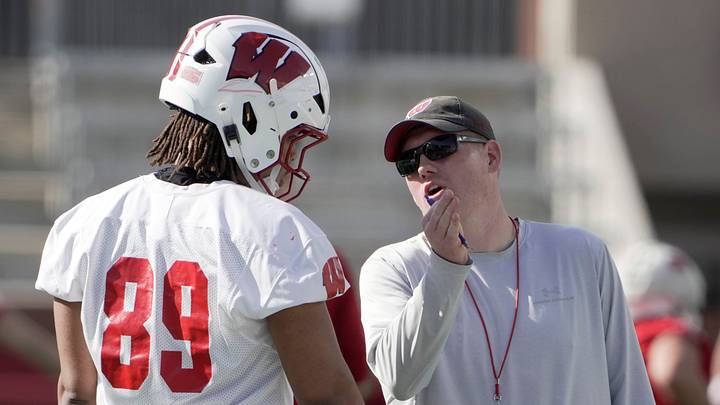 Wisconsin assistant head coach/tight ends Nate Letton talks with tight end Jacob Harris (89) is shown during spring football practice Tuesday, April 21, 2026 at Camp Randall Stadium in Madison, Wisconsin. Wisconsin assistant head coach/tight ends Nate Letton talks with tight end Jacob Harris (89) is shown during spring football practice Tuesday, April 21, 2026 at Camp Randall Stadium in Madison, Wisconsin.