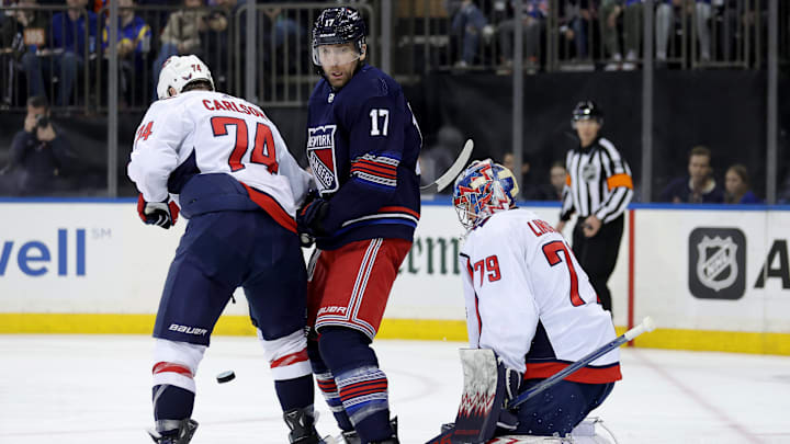 Jan 14, 2024; New York, New York, USA; New York Rangers right wing Blake Wheeler (17) fights for the