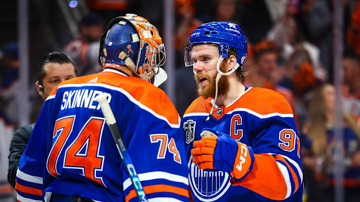 Jun 21, 2024; Edmonton, Alberta, CAN; Edmonton Oilers goaltender Stuart Skinner (74) and center Connor McDavid (97) celebrates win after defeating Florida Panthers in game six of the 2024 Stanley Cup Final at Rogers Place. Mandatory Credit: Sergei Belski-USA TODAY Sports