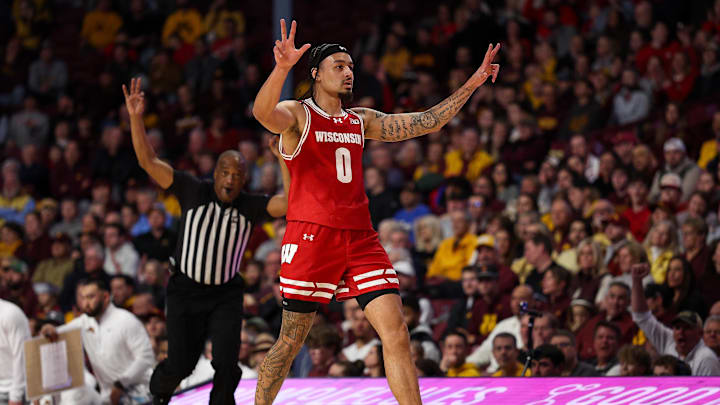 Jan 13, 2026; Minneapolis, Minnesota, USA; Wisconsin Badgers guard Braeden Carrington (0) celebrates his three-point basket against the Minnesota Golden Gophers during the first half at Williams Arena. Mandatory Credit: Matt Krohn-Imagn Images