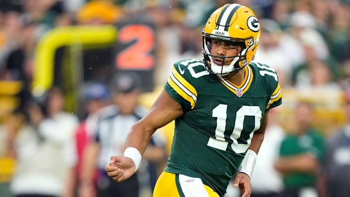 Aug 9, 2025; Green Bay, Wisconsin, USA;  Green Bay Packers quarterback Jordan Love (10) watches the ball after handing it off during the first quarter against the New York Jets at Lambeau Field. Mandatory Credit: Kayla Wolf-Imagn Images