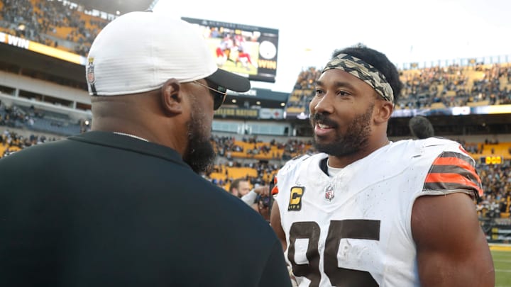 Dec 8, 2024; Pittsburgh, Pennsylvania, USA; Pittsburgh Steelers head coach Mike Tomlin (left) and Cleveland Browns defensive end Myles Garrett (95) talk after playing at Acrisure Stadium. Mandatory Credit: Charles LeClaire-Imagn Images Dec 8, 2024; Pittsburgh, Pennsylvania, USA; Pittsburgh Steelers head coach Mike Tomlin (left) and Cleveland Browns defensive end Myles Garrett (95) talk after playing at Acrisure Stadium. Mandatory Credit: Charles LeClaire-Imagn Images