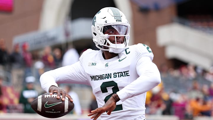 Nov 1, 2025; Minneapolis, Minnesota, USA; Michigan State Spartans quarterback Aidan Chiles (2) warms up before the game against the Minnesota Golden Gophers at Huntington Bank Stadium. Mandatory Credit: Matt Krohn-Imagn Images Nov 1, 2025; Minneapolis, Minnesota, USA; Michigan State Spartans quarterback Aidan Chiles (2) warms up before the game against the Minnesota Golden Gophers at Huntington Bank Stadium. Mandatory Credit: Matt Krohn-Imagn Images