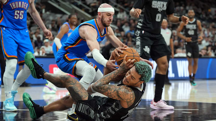 Mar 2, 2025; San Antonio, Texas, USA; San Antonio Spurs forward Jeremy Sochan (10) and Oklahoma City Thunder guard Alex Caruso (9) battle for a loose ball in the first half at Frost Bank Center. Mandatory Credit: Daniel Dunn-Imagn Images Mar 2, 2025; San Antonio, Texas, USA; San Antonio Spurs forward Jeremy Sochan (10) and Oklahoma City Thunder guard Alex Caruso (9) battle for a loose ball in the first half at Frost Bank Center. Mandatory Credit: Daniel Dunn-Imagn Images