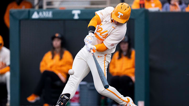 Tennessee's Reese Chapman (13) hits a grand slam during a college baseball game between Tennessee and Hofstra at Lindsey Nelson Stadium in Knoxville on Sunday, Feb. 16, 2025.