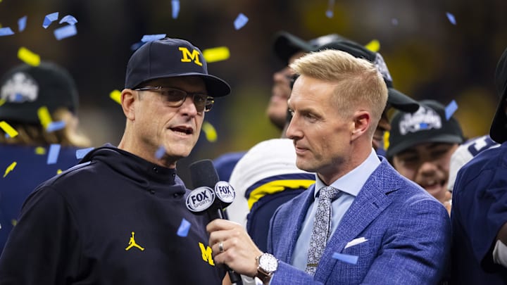 Dec 4, 2021; Indianapolis, IN, USA; Fox Sports analyst Joel Klatt interviews Michigan Wolverines head coach Jim Harbaugh after defeating the Iowa Hawkeyes in the Big Ten Conference championship game at Lucas Oil Stadium. Mandatory Credit: Mark J. Rebilas-Imagn Images Dec 4, 2021; Indianapolis, IN, USA; Fox Sports analyst Joel Klatt interviews Michigan Wolverines head coach Jim Harbaugh after defeating the Iowa Hawkeyes in the Big Ten Conference championship game at Lucas Oil Stadium. Mandatory Credit: Mark J. Rebilas-Imagn Images