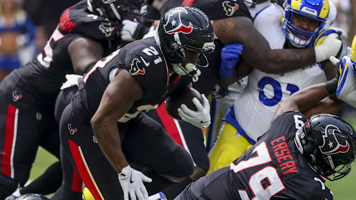 Sep 7, 2025; Inglewood, California, USA; Houston Texans running back Nick Chubb (21) runs with the ball during the first quarter at SoFi Stadium. Mandatory Credit: Kiyoshi Mio-Imagn Images