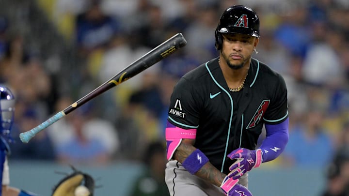 Mar 28, 2026; Los Angeles, California, USA; Arizona Diamondbacks second baseman Ketel Marte (4) tosses his bat after walking during the fifth inning against the Los Angeles Dodgers at Dodger Stadium. Mandatory Credit: Jayne Kamin-Oncea-Imagn Images Mar 28, 2026; Los Angeles, California, USA; Arizona Diamondbacks second baseman Ketel Marte (4) tosses his bat after walking during the fifth inning against the Los Angeles Dodgers at Dodger Stadium. Mandatory Credit: Jayne Kamin-Oncea-Imagn Images