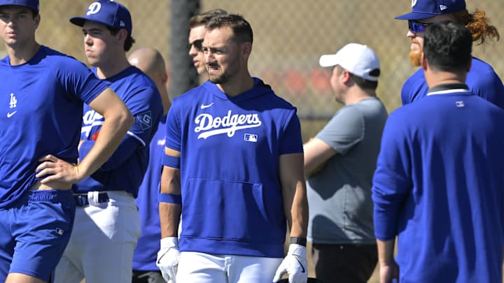 Feb 18, 2025; Glendale, AZ, USA;  Los Angeles Dodgers center fielder Michael Conforto (23) looks on during spring training workouts at Camelback Ranch. Mandatory Credit: Jayne Kamin-Oncea-Imagn Images