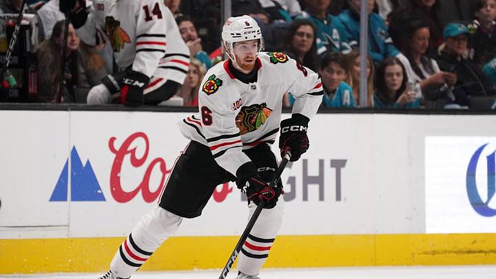Apr 6, 2026; San Jose, California, USA;  Chicago Blackhawks defenseman Sam Rinzel (6) controls the puck against the San Jose Sharks in the first period at SAP Center at San Jose. Mandatory Credit: David Gonzales-Imagn Images
