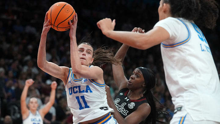 UCLA Bruins guard Gabriela Jaquez (11) grabs a rebound over South Carolina Gamecocks guard Raven Johnson (25) during the NCAA women's basketball national championship at Mortgage Matchup Center in Phoenix on April 5, 2026. UCLA Bruins guard Gabriela Jaquez (11) grabs a rebound over South Carolina Gamecocks guard Raven Johnson (25) during the NCAA women's basketball national championship at Mortgage Matchup Center in Phoenix on April 5, 2026.