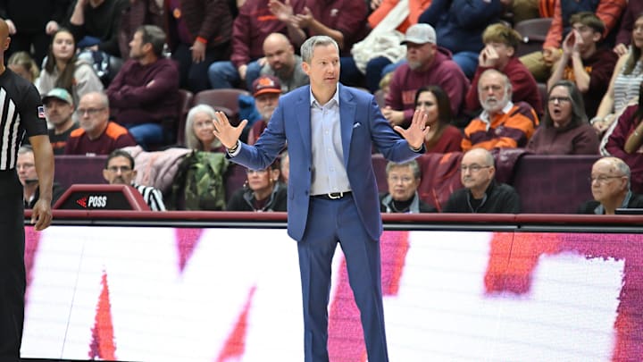 Dec 31, 2025; Blacksburg, Virginia, USA; Virginia Cavaliers head coach Ryan Odom gives his team instructions during the first overtime periodat Cassell Coliseum. Mandatory Credit: Brian Bishop-Imagn Images Dec 31, 2025; Blacksburg, Virginia, USA; Virginia Cavaliers head coach Ryan Odom gives his team instructions during the first overtime periodat Cassell Coliseum. Mandatory Credit: Brian Bishop-Imagn Images