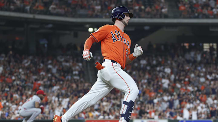 Los Angeles Angels relief pitcher Roansy Contreras (57) reacts and Houston Astros right fielder Kyle Tucker (30) rounds the bases after hitting a home run during the sixth inning at Minute Maid Park on Sept 20.