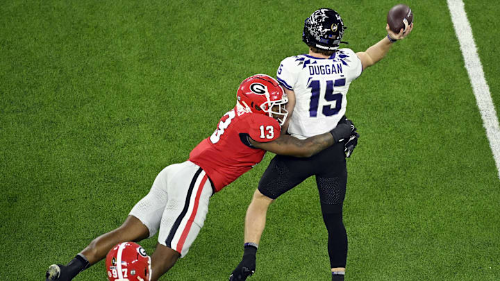 Georgia Bulldogs defensive lineman Mykel Williams (13) hits TCU Horned Frogs quarterback Max Duggan.