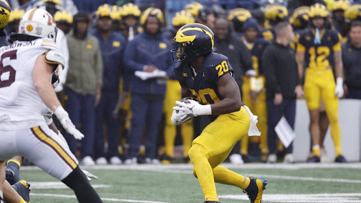 Sep 28, 2024; Ann Arbor, Michigan, USA; Michigan Wolverines running back Kalel Mullings (20) rushes in the first half against the Minnesota Golden Gophers at Michigan Stadium. Mandatory Credit: Rick Osentoski-Imagn Images Sep 28, 2024; Ann Arbor, Michigan, USA; Michigan Wolverines running back Kalel Mullings (20) rushes in the first half against the Minnesota Golden Gophers at Michigan Stadium. Mandatory Credit: Rick Osentoski-Imagn Images