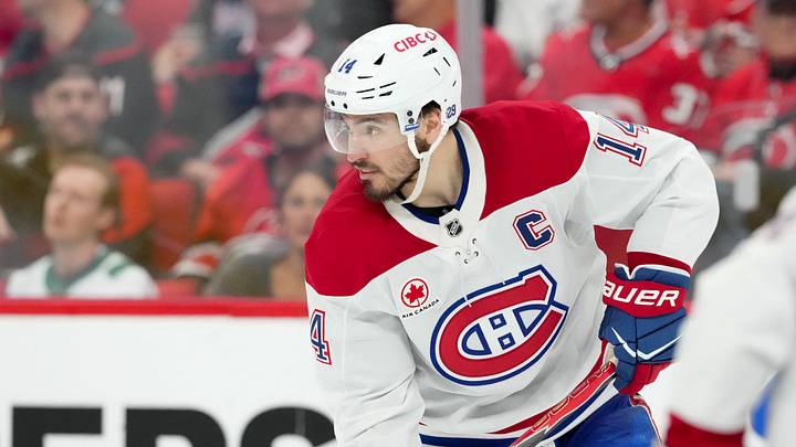 May 21, 2026; Raleigh, North Carolina, USA; Montreal Canadiens center Nick Suzuki (14) skates against the Carolina Hurricanes during the third period in game one of the Eastern Conferene Final of the 2026 Stanley Cup Playoffs at Lenovo Center. Mandatory Credit: James Guillory-Imagn Images