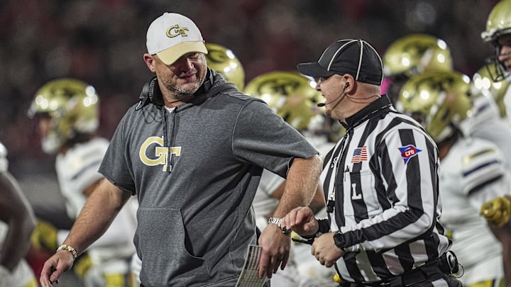 Nov 29, 2024; Athens, Georgia, USA; Georgia Tech Yellow Jackets head coach Brent Key reacts with an official during the game against the Georgia Bulldogs during the first quarter at Sanford Stadium. Mandatory Credit: Dale Zanine-Imagn Images