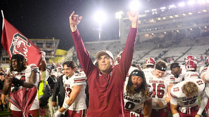 Nov 9, 2024; Nashville, Tennessee, USA; South Carolina Gamecocks head coach Shane Beamer and his team celebrate the after defeating the Vanderbilt Commodores at FirstBank Stadium. Mandatory Credit: Steve Roberts-Imagn Images Nov 9, 2024; Nashville, Tennessee, USA; South Carolina Gamecocks head coach Shane Beamer and his team celebrate the after defeating the Vanderbilt Commodores at FirstBank Stadium. Mandatory Credit: Steve Roberts-Imagn Images