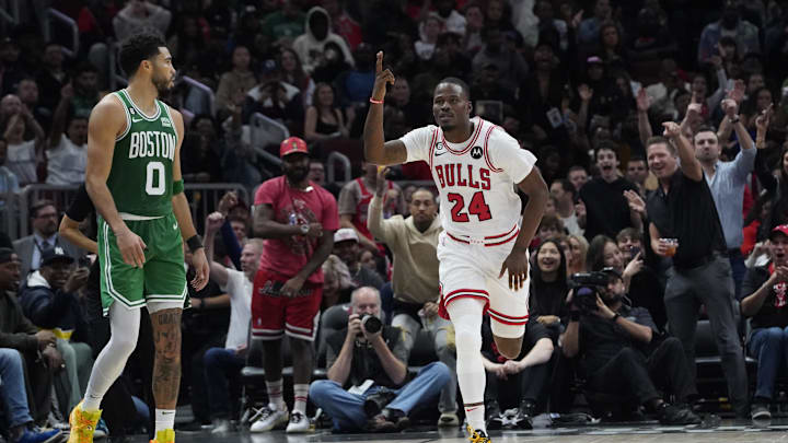 Oct 24, 2022; Chicago, Illinois, USA; Chicago Bulls forward Javonte Green (24) gestures after making a three-point basket as Boston Celtics forward Jayson Tatum (0) stands nearby during the second half at United Center. Mandatory Credit: David Banks-Imagn Images