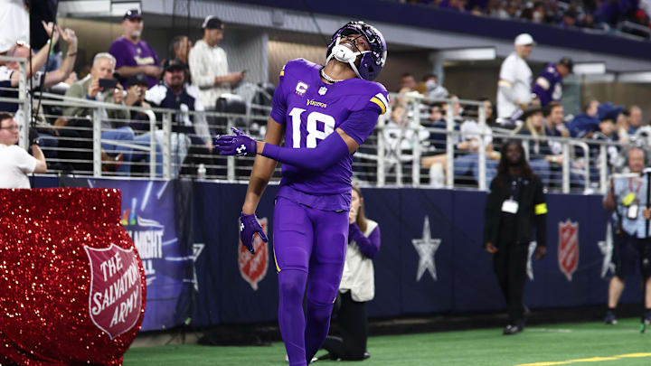 Dec 14, 2025; Arlington, Texas, USA; Minnesota Vikings wide receiver Justin Jefferson (18) reacts after a play during the first half against the Dallas Cowboys at AT&T Stadium. Mandatory Credit: Kevin Jairaj-Imagn Images