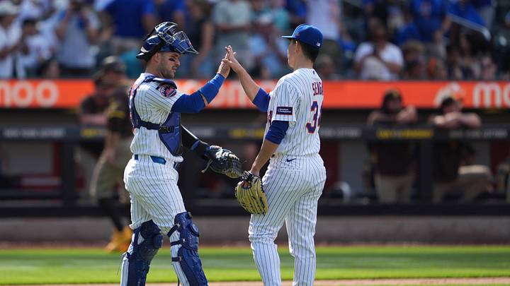 Aug 19, 2026; New York City, New York, USA; New York Mets catcher Luis Torrens (13) and pitcher Kodai Senga (34) celebrate the victory against the San Diego Padres after the ninth inning at Citi Field. Mandatory Credit: Gregory Fisher-Imagn Images