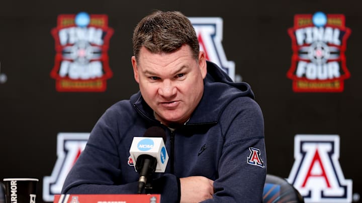 Apr 3, 2026; Indianapolis, IN, USA; Arizona Wildcats head coach Tommy Lloyd speaks during a press conference ahead of the Final Four of the men's 2026 NCAA Tournament at Lucas Oil Stadium. Mandatory Credit: Trevor Ruszkowski-Imagn Images Apr 3, 2026; Indianapolis, IN, USA; Arizona Wildcats head coach Tommy Lloyd speaks during a press conference ahead of the Final Four of the men's 2026 NCAA Tournament at Lucas Oil Stadium. Mandatory Credit: Trevor Ruszkowski-Imagn Images