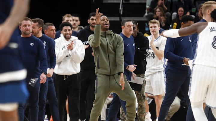 Feb 2, 2026; Memphis, Tennessee, USA; Memphis Grizzlies guard Ja Morant (12) reacts with forward/center Jaren Jackson Jr. (8) after a basket during the fourth quarter against the Minnesota Timberwolves at FedExForum. Mandatory Credit: Petre Thomas-Imagn Images