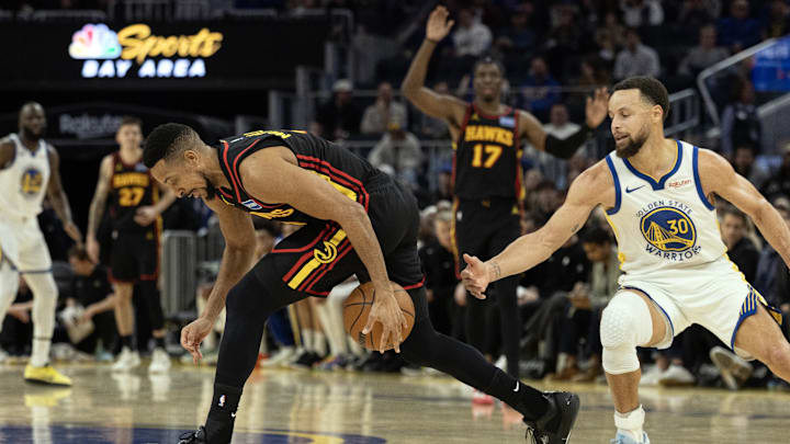 Jan 11, 2026; San Francisco, California, USA; Atlanta Hawks guard CJ McCollum (3) momentarily loses his dribble as he is harassed by Golden State Warriors guard Stephen Curry (30) during the fourth quarter at Chase Center. Mandatory Credit: D. Ross Cameron-Imagn Images