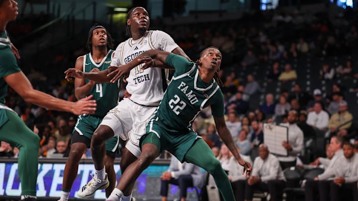 Dec 28, 2025; Atlanta, Georgia, USA; Florida A&M Rattlers forward Tyler Shirley (22) and guard Anquan Boldin Jr. (4) box out Georgia Tech Yellow Jackets forward Baye Ndongo (11) in the second half at McCamish Pavilion. Mandatory Credit: Brett Davis-Imagn Images