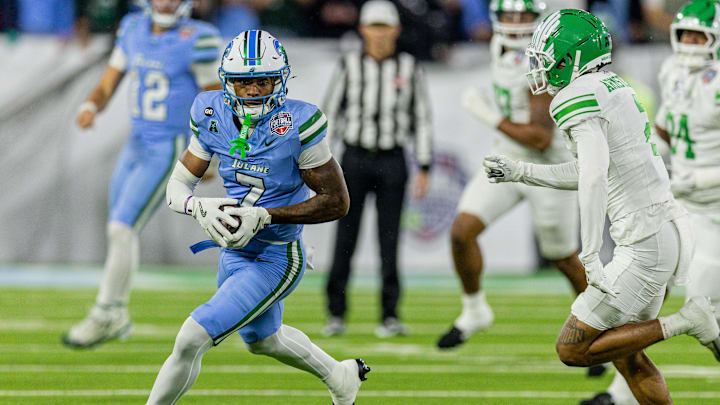 Dec 5, 2025; New Orleans, LA, USA;  Tulane Green Wave wide receiver Shazz Preston (7) runs against the North Texas Mean Green during the first half in the 2025 American Championship at Yulman Stadium. Mandatory Credit: Stephen Lew-Imagn Images