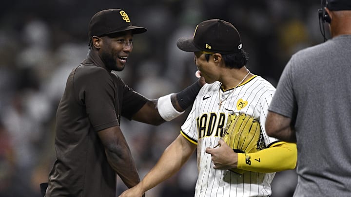 Jun 25, 2024; San Diego, California, USA; San Diego Padres left fielder Jurickson Profar (10) and shortstop Ha-Seong Kim (7) celebrate on the field after defeating the Washington Nationals at Petco Park. Mandatory Credit: Orlando Ramirez-Imagn Images