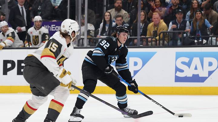 Utah Mammoth center Logan Cooley (92) looks to shoot against Vegas Golden Knights defenseman Noah Hanifin (15) during the third period in game four of the first round of the 2026 Stanley Cup Playoffs at Delta Center. Mandatory Credit: Rob Gray-Imagn Images Utah Mammoth center Logan Cooley (92) looks to shoot against Vegas Golden Knights defenseman Noah Hanifin (15) during the third period in game four of the first round of the 2026 Stanley Cup Playoffs at Delta Center. Mandatory Credit: Rob Gray-Imagn Images