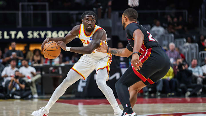 Oct 13, 2025; Atlanta, Georgia, USA; Atlanta Hawks guard Keaton Wallace (2) dribbles the ball down the court against Miami Heat guard Norman Powell (24) during the first quarter at State Farm Arena. Mandatory Credit: Jordan Godfree-Imagn Images Oct 13, 2025; Atlanta, Georgia, USA; Atlanta Hawks guard Keaton Wallace (2) dribbles the ball down the court against Miami Heat guard Norman Powell (24) during the first quarter at State Farm Arena. Mandatory Credit: Jordan Godfree-Imagn Images