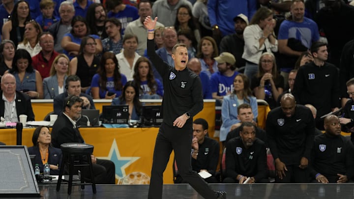 Apr 5, 2025; San Antonio, TX, USA; Duke Blue Devils head coach Jon Scheyer reacts against the Houston Cougars during the first half in the semifinals of the men's Final Four of the 2025 NCAA Tournament at Alamodome. Mandatory Credit: Scott Wachter-Imagn Images
Apr 5, 2025; San Antonio, TX, USA; Duke Blue Devils head coach Jon Scheyer reacts against the Houston Cougars during the first half in the semifinals of the men's Final Four of the 2025 NCAA Tournament at Alamodome. Mandatory Credit: Scott Wachter-Imagn Images