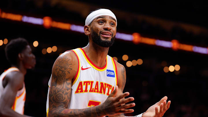 Hawks guard Nickeil Alexander-Walker reacts during game against the Charlotte Hornets. Hawks guard Nickeil Alexander-Walker reacts during game against the Charlotte Hornets.