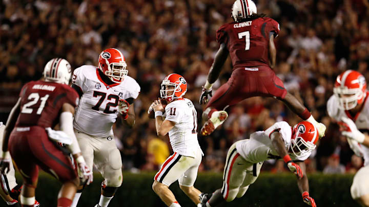 South Carolina football legend Jadeveon Clowney hurdling a blocker on his way to terrorize Georgia Bulldogs QB Aaron Murray