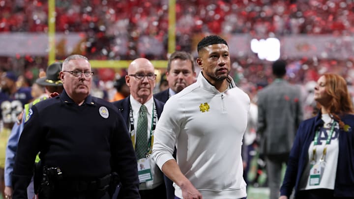 Jan 20, 2025; Atlanta, GA, USA; Notre Dame Fighting Irish head coach Marcus Freeman reacts after losing against the Ohio State Buckeyes in the CFP National Championship college football game at Mercedes-Benz Stadium. Mandatory Credit: Brett Davis-Imagn Images
