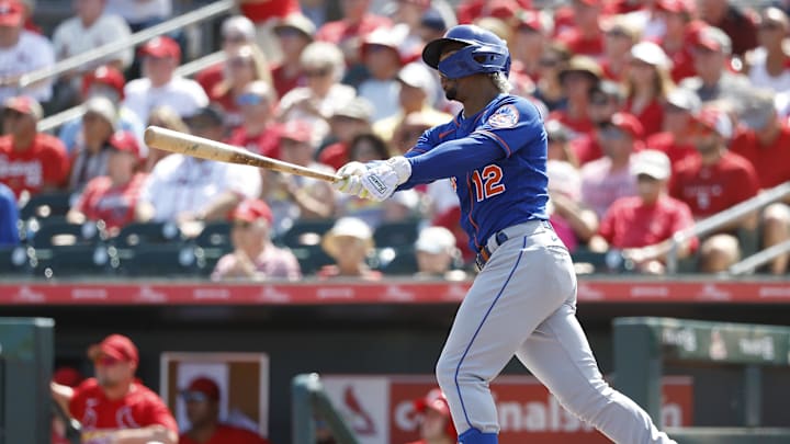 Mar 5, 2023; Jupiter, Florida, USA; New York Mets short stop Francisco Lindor (12) follows through
