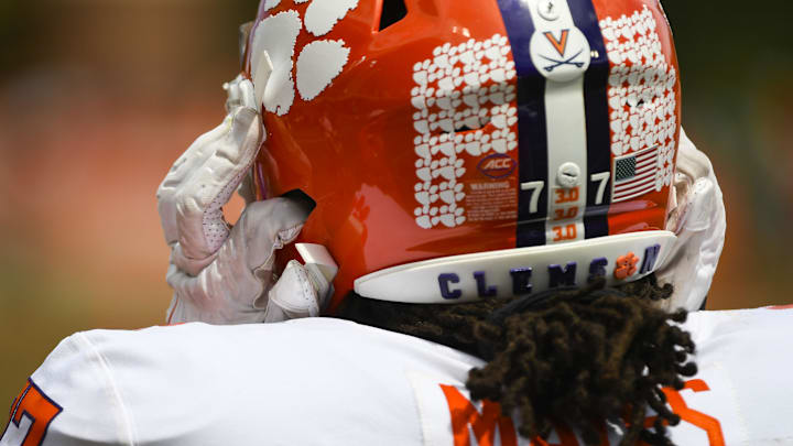 April 15, 2023; Clemson, SC , USA;   Clemson offensive lineman Mitchell Mayes (77) puts his helmet on during the annual Orange and White Spring game at Memorial Stadium in Clemson, S.C. Saturday, April 15, 2023.   