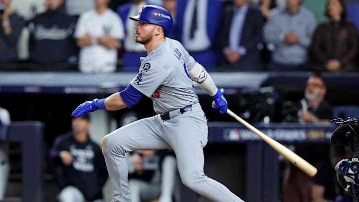 Oct 30, 2024; New York, New York, USA; Los Angeles Dodgers second baseman Gavin Lux (9) hits a sacrifice fly during the eighth inning against the New York Yankees in game four of the 2024 MLB World Series at Yankee Stadium. Mandatory Credit: Brad Penner-Imagn Images Oct 30, 2024; New York, New York, USA; Los Angeles Dodgers second baseman Gavin Lux (9) hits a sacrifice fly during the eighth inning against the New York Yankees in game four of the 2024 MLB World Series at Yankee Stadium. Mandatory Credit: Brad Penner-Imagn Images