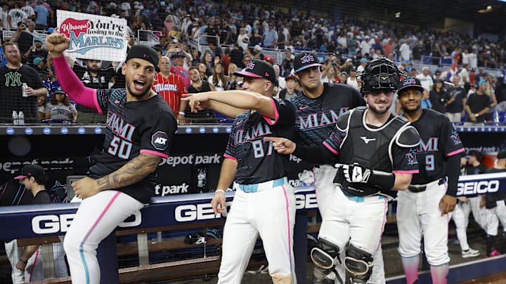 Miami Marlins players celebrate after game 