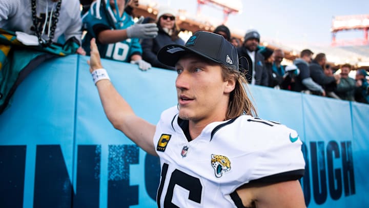 Nov 30, 2025; Nashville, Tennessee, USA;  Jacksonville Jaguars quarterback Trevor Lawrence (16) high fives the fans against the Tennessee Titans during the second half at Nissan Stadium. Mandatory Credit: Steve Roberts-Imagn Images