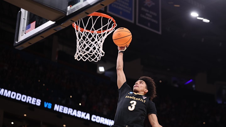 Mar 21, 2026; Oklahoma City, OK, USA; Vanderbilt Commodores guard Tyler Tanner (3) dunks during the first half against the Nebraska Cornhuskers in a second round game of the men's 2026 NCAA Tournament at Paycom Center. Mandatory Credit: William Purnell-Imagn Images