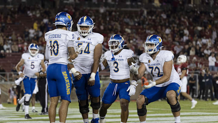 Sep 27, 2025; Stanford, California, USA;  San Jose State Spartans wide receiver Danny Scudero (10) celebrates with offensive lineman Daniel Moleni (54), running back Floyd Chalk IV (3), and offensive lineman Nate Hale (72) during the fourth quarter against the Stanford Cardinal at Stanford Stadium. Mandatory Credit: Stan Szeto-Imagn Image