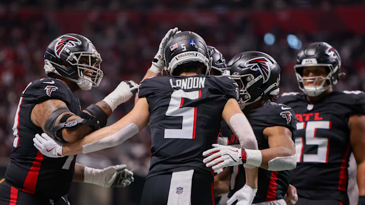 Atlanta Falcons wide receiver Drake London celebrates with teammates after a touchdown catch against the New Orleans Saints. Atlanta Falcons wide receiver Drake London celebrates with teammates after a touchdown catch against the New Orleans Saints.